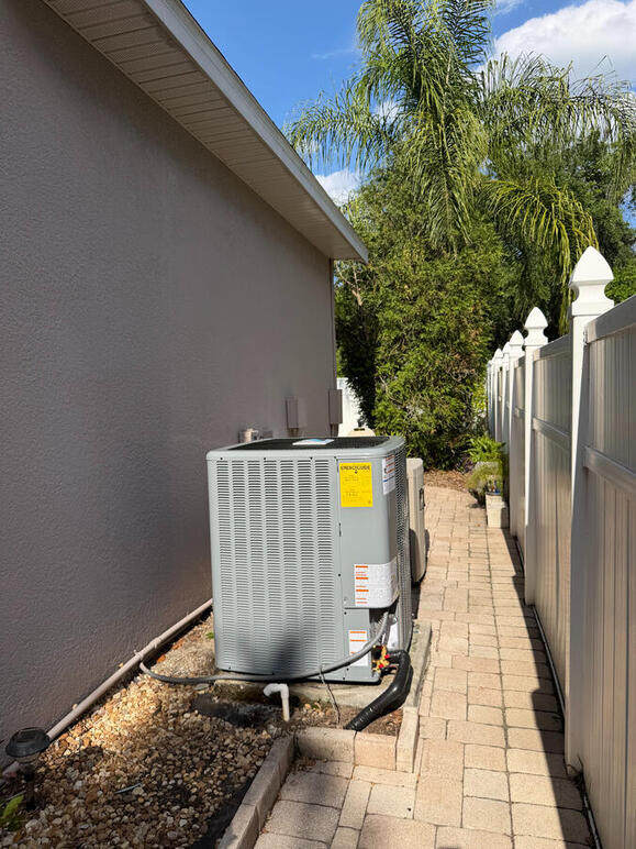 Don't let a narrow lot limit your comfort. This space-saving AC installation shows how we utilize custom layouts to provide powerful cooling even in tight side-yard walkways. We specialize in HVAC solutions that maintain proper clearance for airflow. Don't let a narrow lot limit your comfort. This space-saving AC installation shows how we utilize custom layouts to provide powerful cooling even in tight side-yard walkways. We specialize in HVAC solutions that maintain proper clearance for airflow.